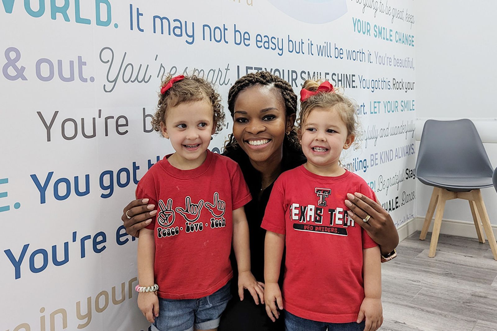 Dr. Bonolo with two young patients at Refined Orthodontics in Midland