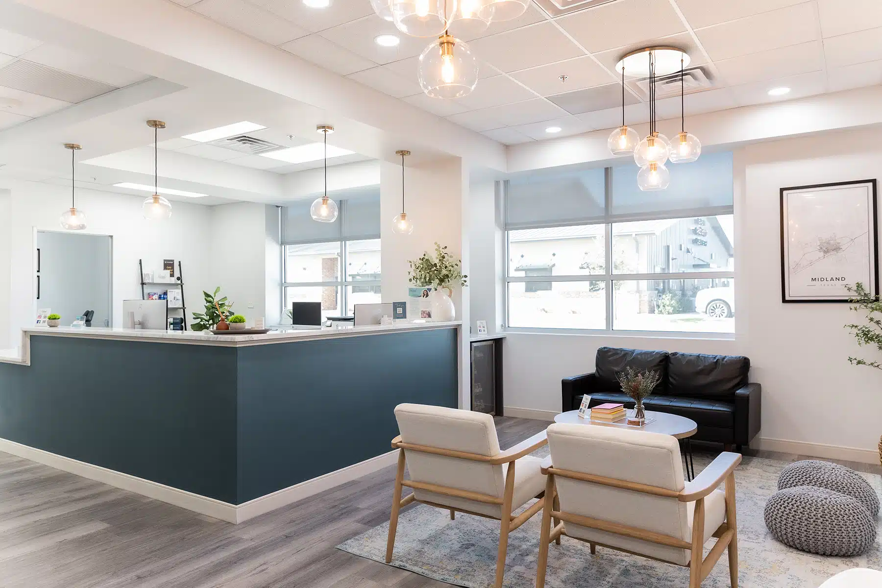 The front desk and waiting area at Refined Orthodontics in Midland